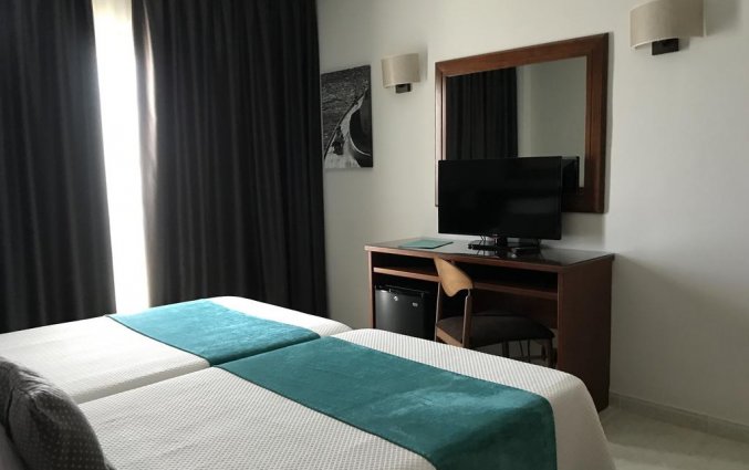 Slaapkamer Hotel Miramar